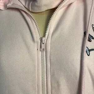 Pale pink zip up jacket - a little more pink in